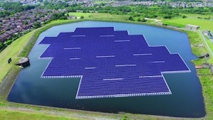  An artist's impression of United Utilities'12,000 panel, £3.5m floating solar PV farm on the Godley Reservoir in Hyde, Manchester - now just starting to be installed. United Utilities