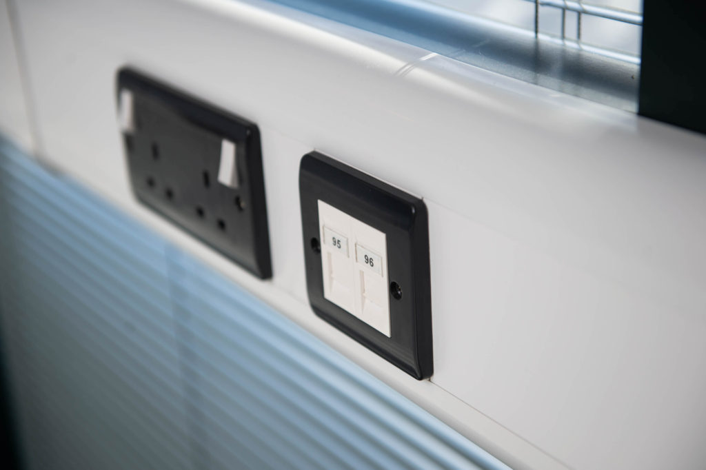 Sterling Curve at dado level Sterling data solution for football club’s state-of-the-art media room